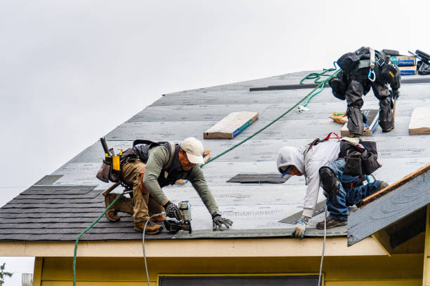 Professional Gutter Installation technician working in Burnham, PA
